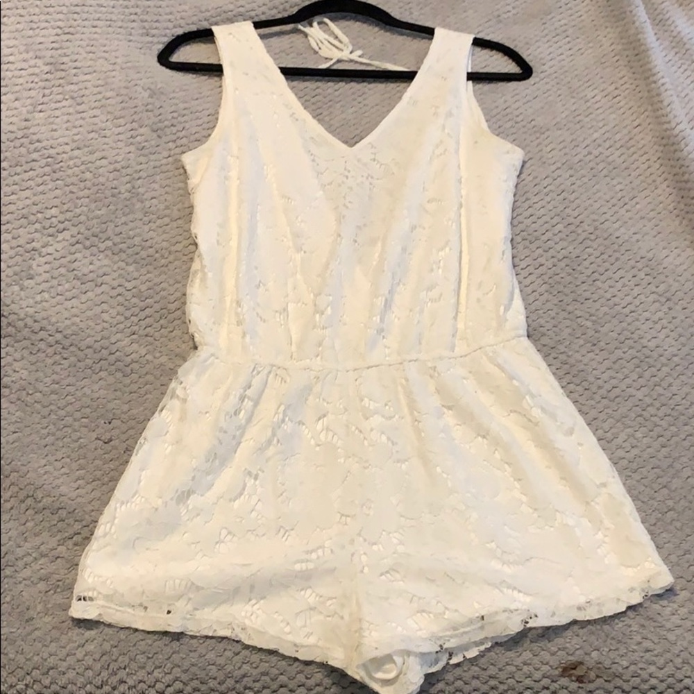 V-neck white lace romper. Only worn once or twice